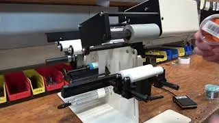 Label Application to round products. TAL-3100R Labeling System