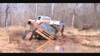 mud truck with big block and big tires takes a dive