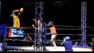AJ Styles hits a Styles Clash on Rey Mysterio