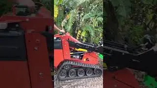 Spliting big log in 5 minutes Wolf ridge 3030hd splitter on ditch witch sk800 mini skid 6 way wedge