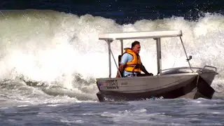Surfing waves in a 14ft/4.2m tinny, at 64-years-old!