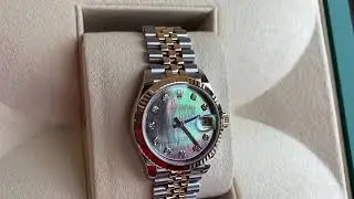 Rolex Datejust 31mm - Black Mother of Pearl with diamonds