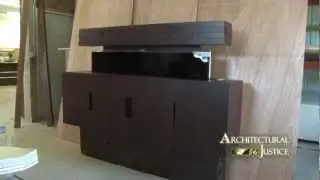 Custom Television Lift By Architectural Justice Featuring a Samsung 65