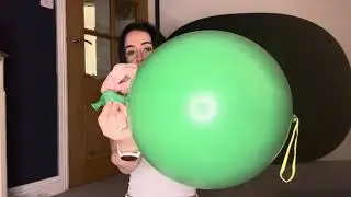 Blowing up and deflating noisy punch bag balloons 