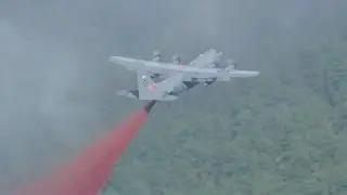 Raw Video: Tanker makes drop on Black Forest Fire