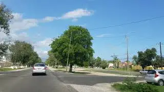 Driving through Central Village in Spanish Town