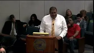 David Zere speaking at the Suffolk County Legislature