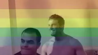 MMA fighters Jason Barrett and Alex Reid share a kiss