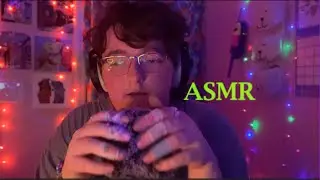 asmr triggers sound assortment (whispering, mouth sounds, fluffy mic, tapping, hand movements)