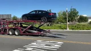 Loading Vehicles On Open Car Carrier Truck - ABC Auto Shipping