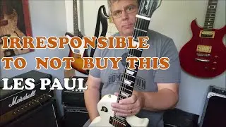 Irresponsible to NOT buy this 2007 Gibson Les Paul Studio. alpine white, gold, ebony