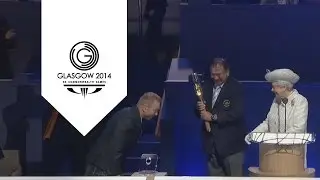 Sir Chris Hoy delivers the Baton to The Queen | Unmissable Moments