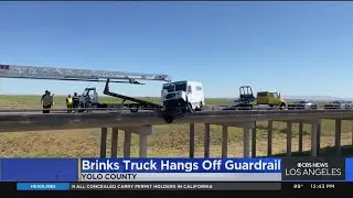 Brinks truck nearly goes off side of highway in Northern California