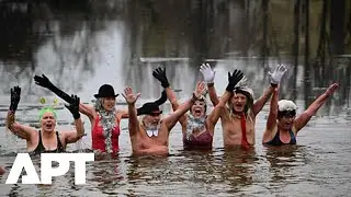 Cold-Weather Tradition: Swimmers Take Plunge in Icy Berlin Lake | APT