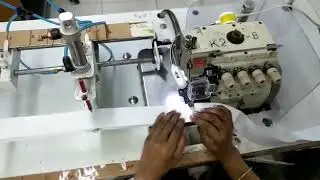 Auto marking, sewing & cutting of waist band elastic machine