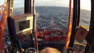Working the crane on a North-sea rig.