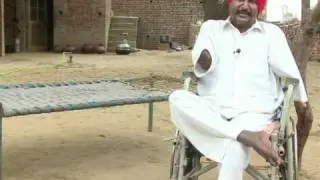 Scarred folk singer gives voice to India's rural poor