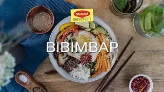 Bibimbap &ndash; koreanisches Reisgericht mit Gem&uuml;se, Hackfleisch und Spiegelei