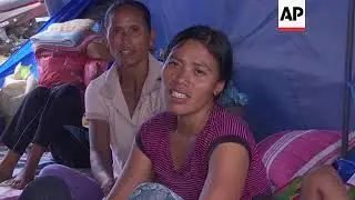 Bali authorities urge many who fled volcano to return home