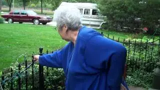 Donna Jean Rueff cleans and decorates the front of the house for Fall on 10-1-2012 A.D. (1)