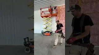 Installing metal wall panels for an interior finish in a shop