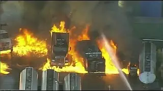 Flames spread as oil tankers burn