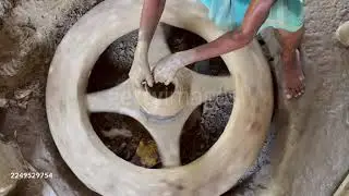 Top View of Artisan Shaping Clay on Traditional Pottery Wheel in Bangladesh | 4K Stock Footage