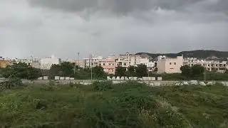 A city behind the mountain valley has an amazing view of the rainy season adventure vlog mini 