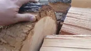Loading some firewood with a truck crane and skidding with a truck.