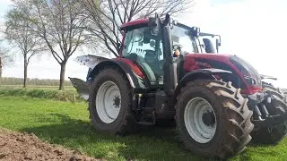 Ploughing with Valtra N154 + FROST 4 furrow reversible plough (cab view)