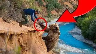 RUSSIAN MAN SAVES BEAR WOUNDED IN PAW IN FOREST