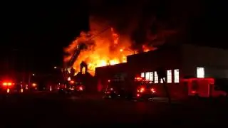 (slow motion) Fire at Uhaul storage Walker's Point, Milwaukee WI