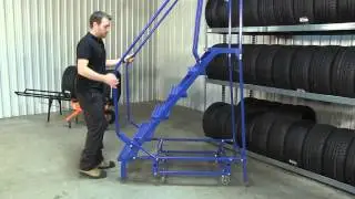 Load and Unload Tires with the Mobile Ladder For Tire Storage Rack - Martins Industries