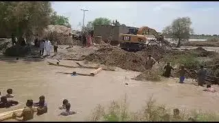 Plugging breach of Manjuti Canal. Irrigation Balochistan, Monsoon Rainfall, Flood