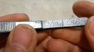 Etching text onto metal