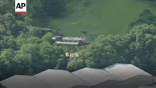 UK: Helicopter used to try and save dam
