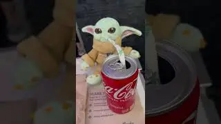 Grogu, Baby Yoda Sips Coca Cola on Airplane!
