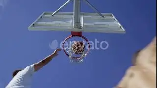 Low angle slow motion shot of man making basketball layup | Stock Footage - Envato elements