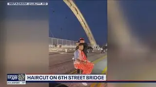 Man gets haircut in middle of traffic on new 6th Street Bridge