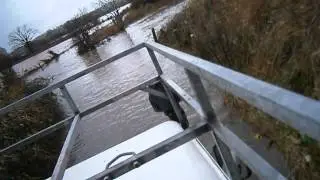 landrover defender in deep water