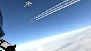 Finnish Air Force F/A-18 Hornet fighters escorting two B-52 bombers to the Rovaj&auml;rvi firing range