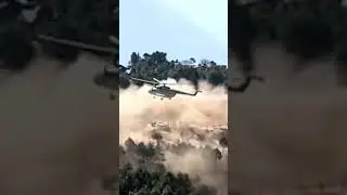 Helicopter Swirls Up dust on landing__# World's Craft.