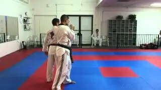 Wrist Grab Defense:  Arc Hand Strike then Wrist Lock