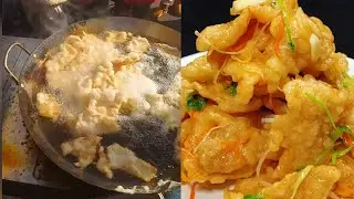 Cooking sweet and sour pork, Chinese delicacy. street food.