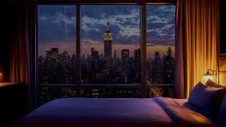 STUNNING NIGHTTIME SCENE OF NEW YORK CITY'S SKYLINE VIEWED FROM A LUXURIOUS HOTEL ROOM WINDOW.