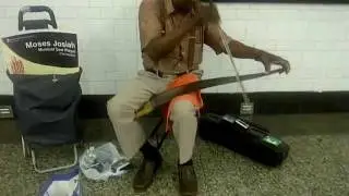 a musical genius play lyrics and tunes from a carpenter saw instrument (2011)