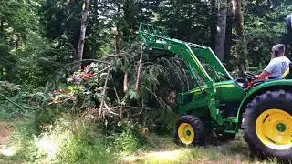 Tractor logging with a 2018 John Deere 4044R with forks