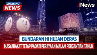 Bundaran HI Diguyur Hujan Deras, Warga Tetap Antusias Rayakan Pergantian Tahun | Breaking News