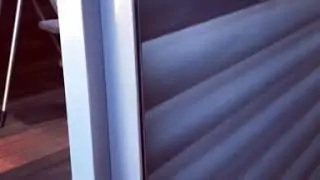 External aluminium shutters with flyscreen