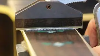 Fret press on Juno EA-50FC